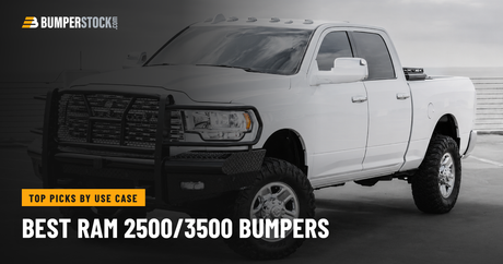 Ram 2500 with an aftermarket steel front bumper and grille guard installed - BumperStock