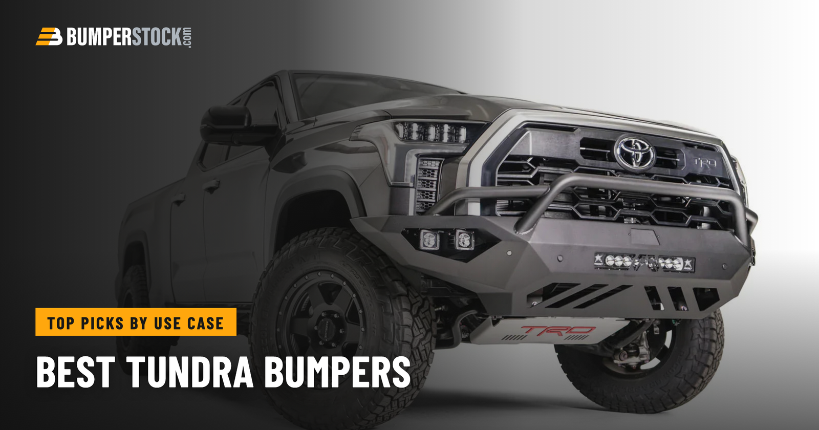 Toyota Tundra fitted with an aftermarket steel front bumper in a ranch and job-site setting
