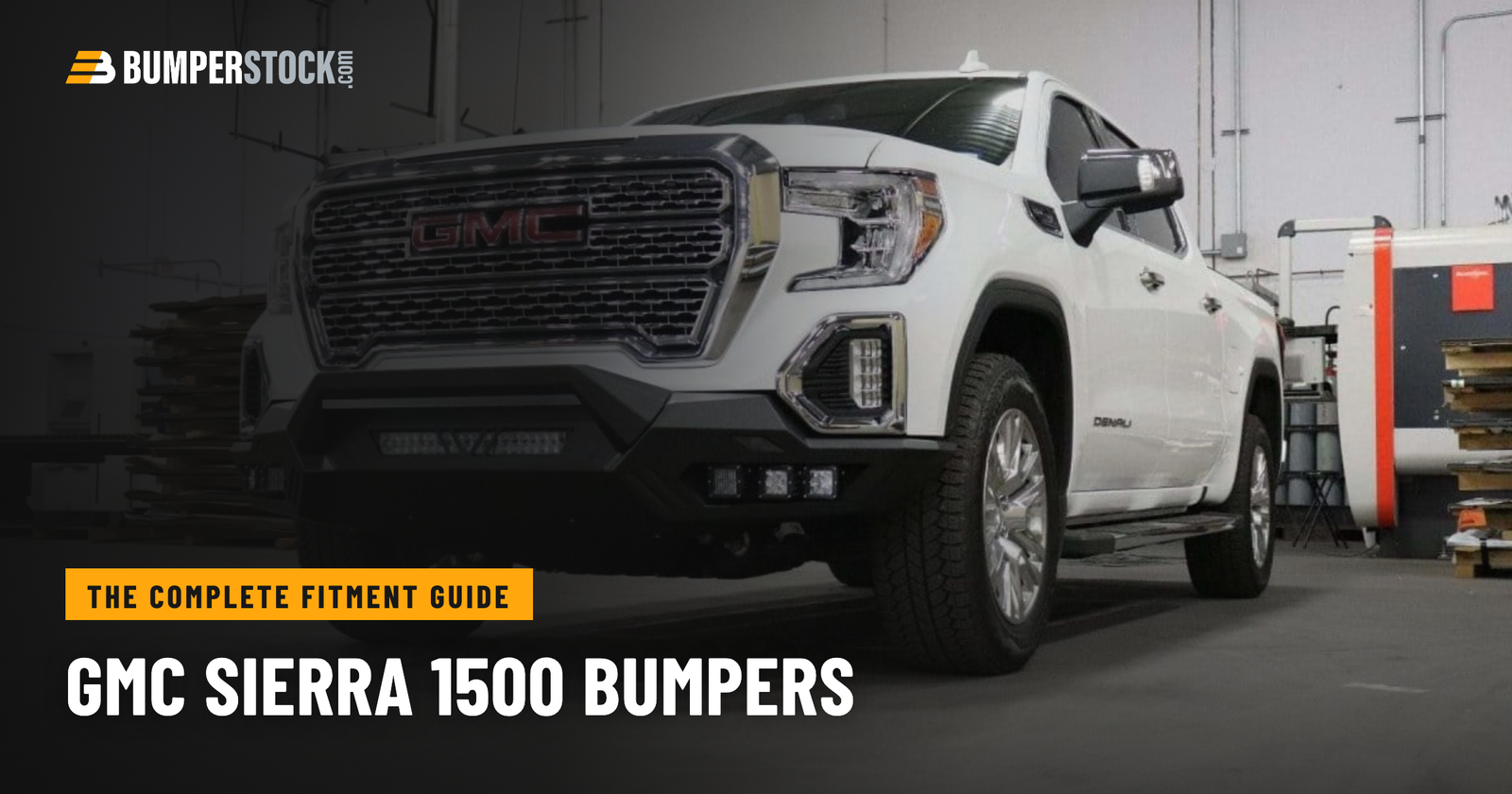GMC Sierra 500_with aftermarket front bumper installed industrial setting