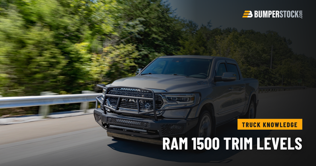 Silver Ram 1500 on the highway wearing a Ranch Hand Midnight front bumper with a grille guard