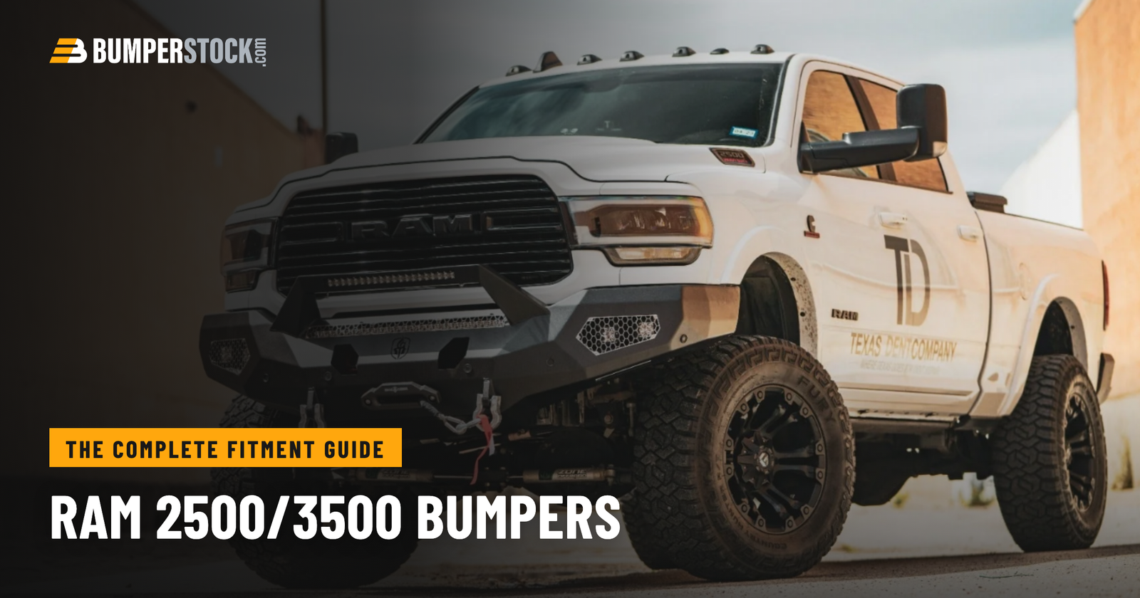 Ram 2500 with aftermarket front bumper installed, work-truck job-site setting